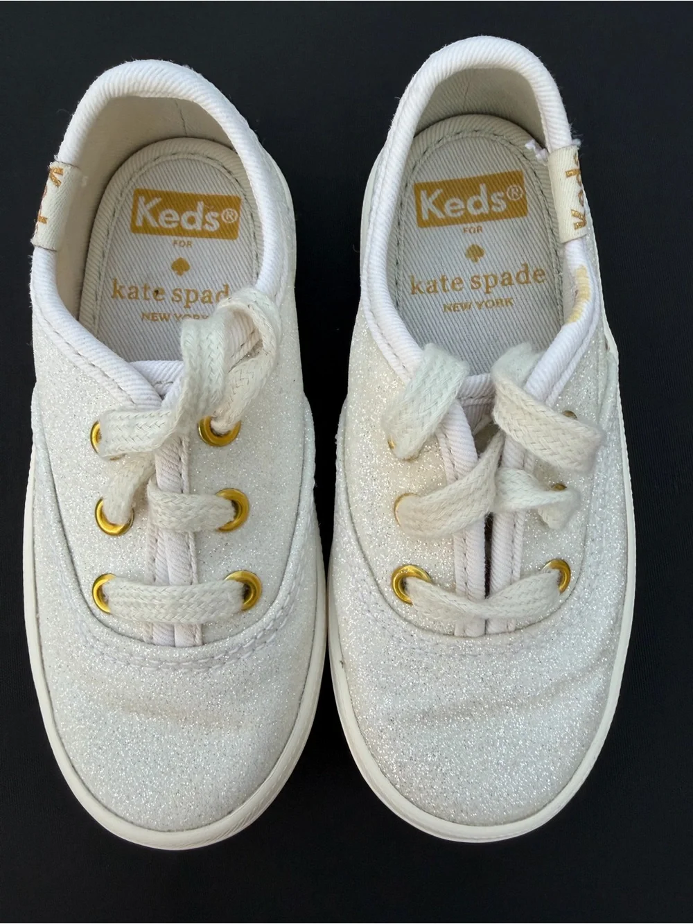 kate spade Kids Glitter Canvas Sneakers in White with Gold Eyelets